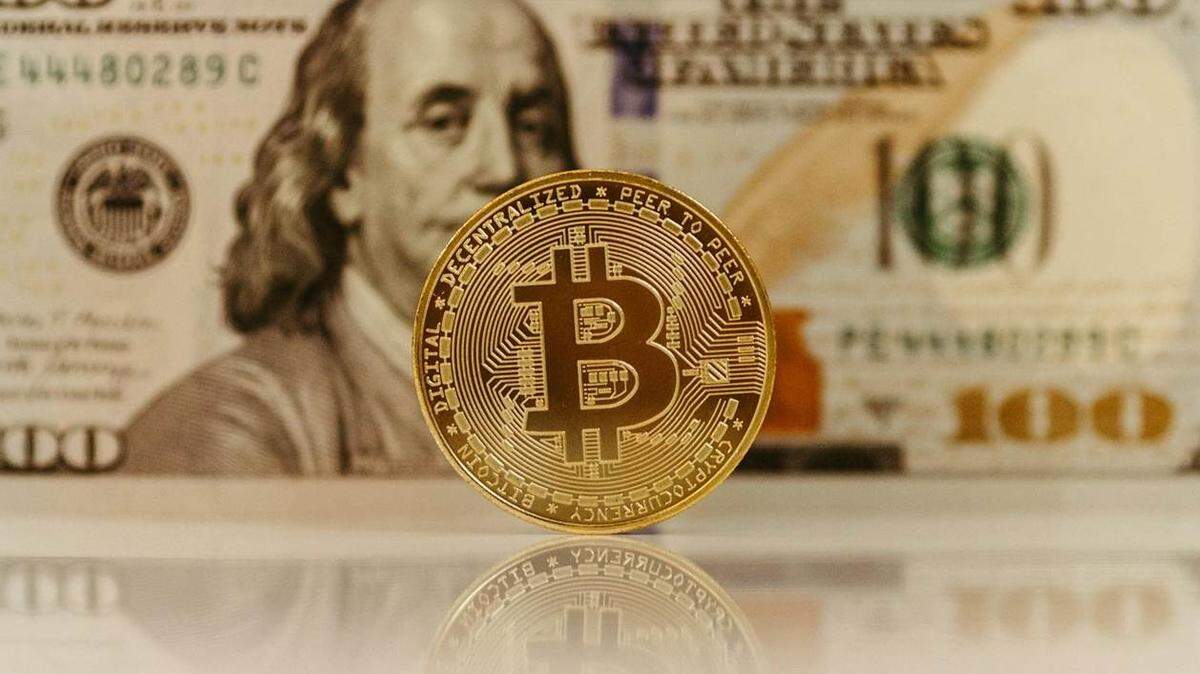 Bitcoin and Hundred Dollar Bill