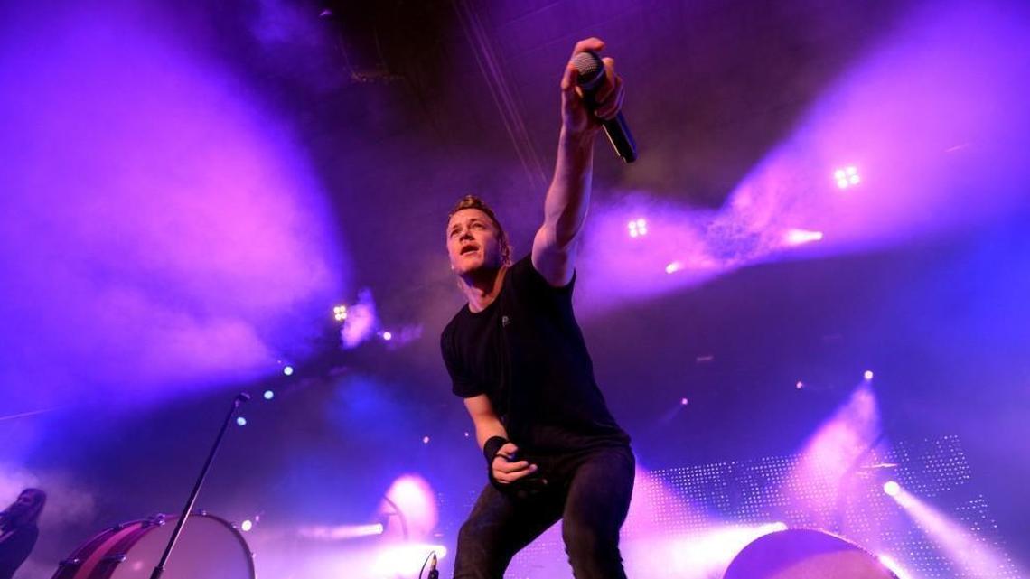 Imagine Dragons lead singer Dan Reynolds opens the show in concert with Paper Route and X Ambassadors at Raleigh's Red Hat Amphitheater, Wednesday night, May 8, 2013.