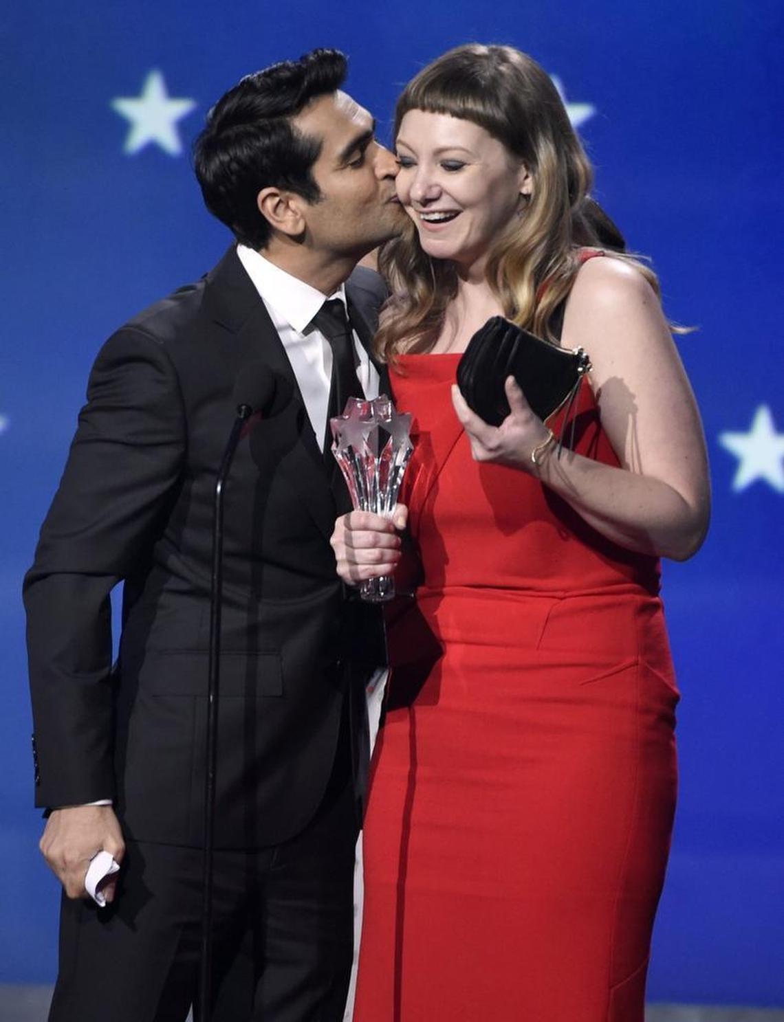 Kumail Nanjiani, left, kisses Emily V. Gordon, a Winston-Salem native, as they accept the award for best comedy for “The Big Sick” at the 23rd annual Critics’ Choice Awards Jan. 11, 2018, in Santa Monica, Calif. Both are nominated for an Academy Award for Best Original Screenplay.