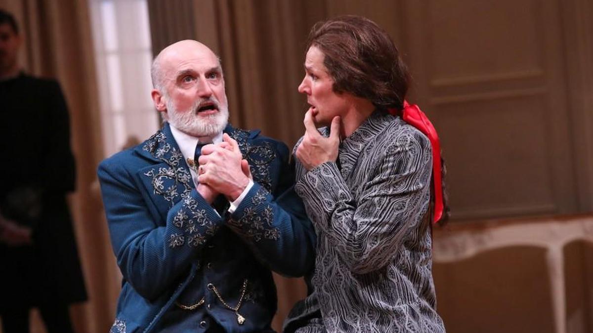 Ray Dooley’s Orgon, left, gets a lesson in piety from a “penitent” Tartuffe (Joey Collins) in Molière’s “Tartuffe” adapted by David Ball.