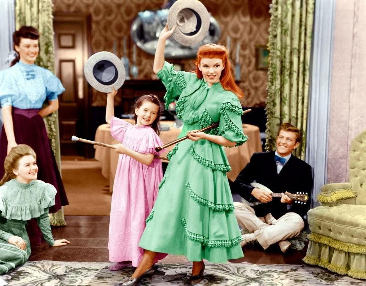 Margaret O’Brien, left, and Judy Garland perform a song and dance routine in a scene from Vincente Minnelli’s 1944 film “Meet Me in St. Louis.”