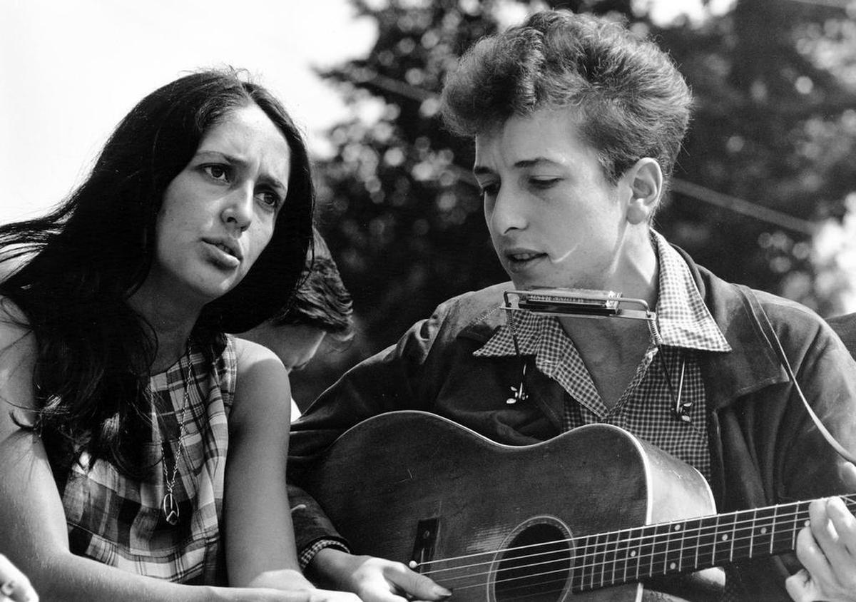 Joan Baez and Bob Dylan perform during a civil rights rally on August 28, 1963, in Washington, D.C. On March 19, 1965, they played a show together at Reynolds Coliseum in Raleigh. Dylan, 23, had already made a name for himself with folky, often topical hit songs for other artists, including “Blowing in the Wind,” “The Times They Are A-Changin’” and “Don’t Think Twice, It’s All Right.” Baez was the more famous of the two until, perhaps, this tour.
