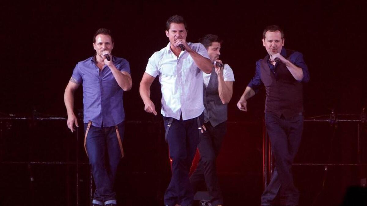 From left, Drew Lachey, Nick Lachey, Jeff Timmons and Justin Jeffre of 98 Degrees will perform Tuesday, Dec. 5 at Durham Performing Arts Center.