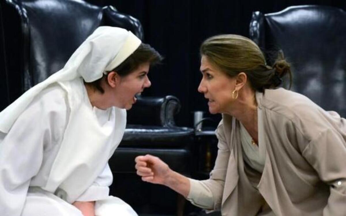 From left, Jill Cromwell as Agnes and Benji Taylor as Dr. Martha Livingston in “Agnes of God” presented by Forest Moon Theater Feb. 23- 26 at Sonorous Road Theatre.