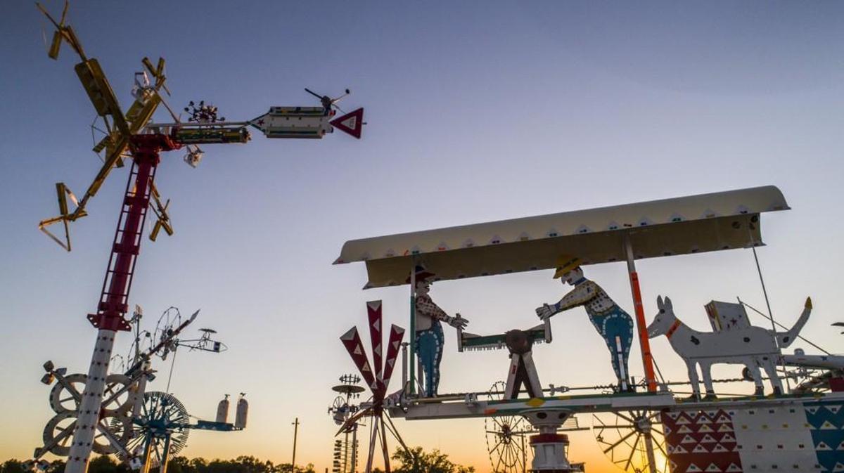 The sun sets Friday, Oct. 30, 2017 at the Vollis Simpson Whirligig Park in Wilson.