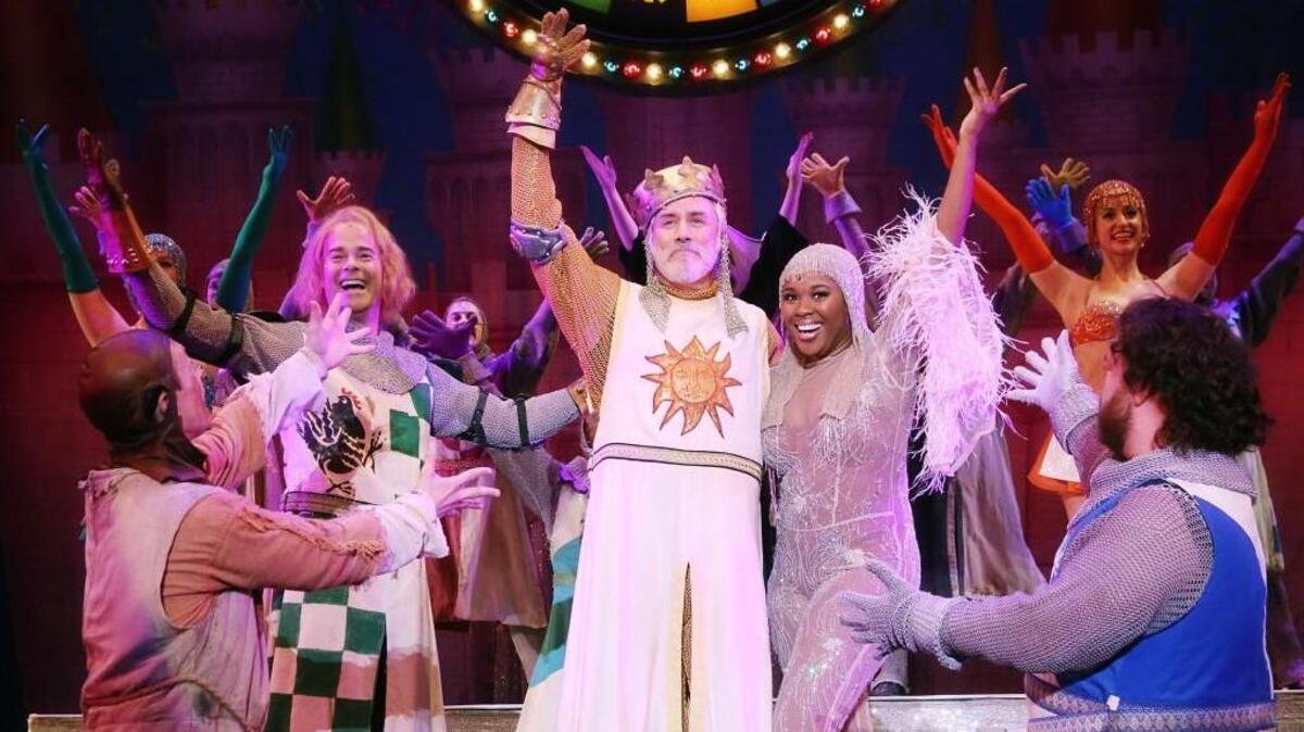 Jeff McCarthy and Ta’Rea Campbell and cast in N.C. Theatre’s production of “Monty Python’s Spamalot.”