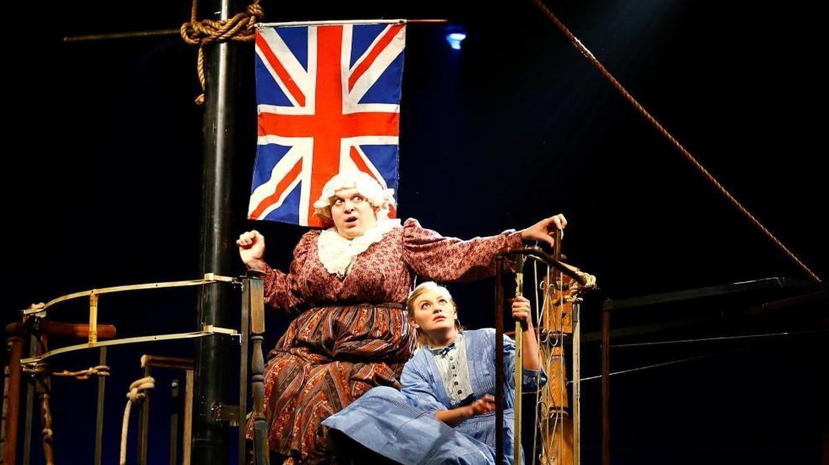 From left, Benjamin Curns as Mrs. Bumbrake and Arielle Yoder as Molly Aster in PlayMakers Repertory Company’s production of “Peter and the Starcatcher.”