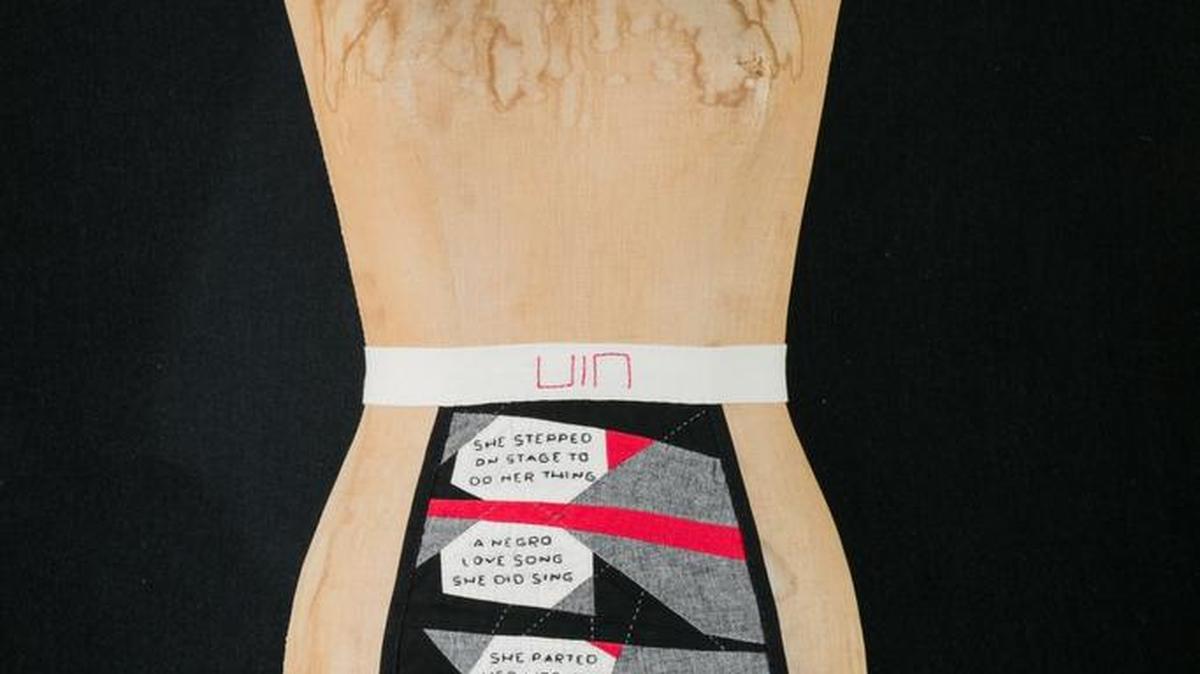 In her exhibit “The Ties That Bind,” Precious Lovell presents 15 aprons to honor ancestors.