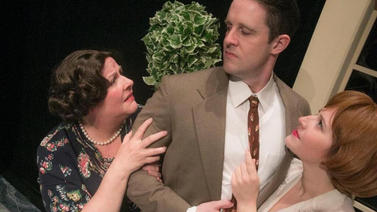 From left, Alison Lawrence as Gerda Christow, Jonathan King as John Christow and Marisa Markoch as Henrietta Angkatell in Agatha Christie’s “The Hollow” at NCSU’s University Theatre.