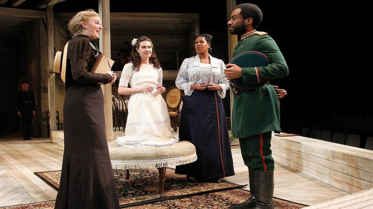 From left, Arielle Yoder as Maria (Masha) Sergeyevna, Allison Altman as Irina Sergeyevna, Marinda Anderson as Olga Sergeyevna and Joshua David Robinson as Aleksander Ignatyevich Vershinin in PlayMakers Repertory Company’s production of “Three Sisters.”