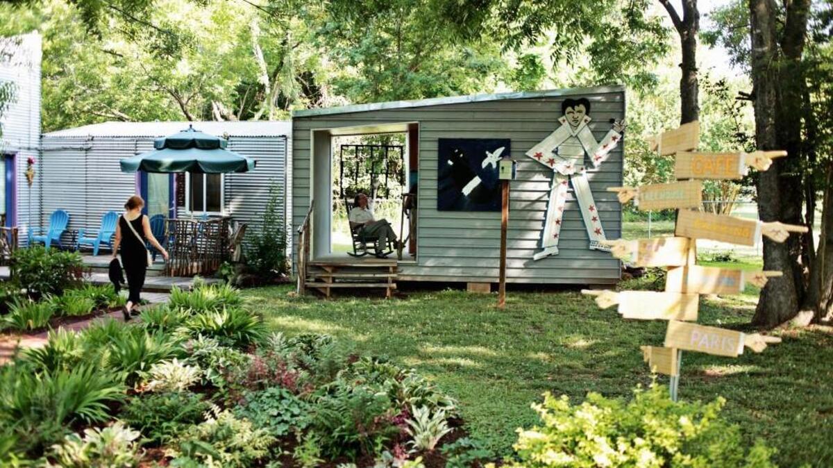 
The Small B&B Cafe in Pittsboro displays a large array of folk art both indoors and outdoors. Jim Massey donated the large Elvis seen on the side of a sitting area. The Small Museum of Folk Art, housing Massey’s collection, will also be on the property.
