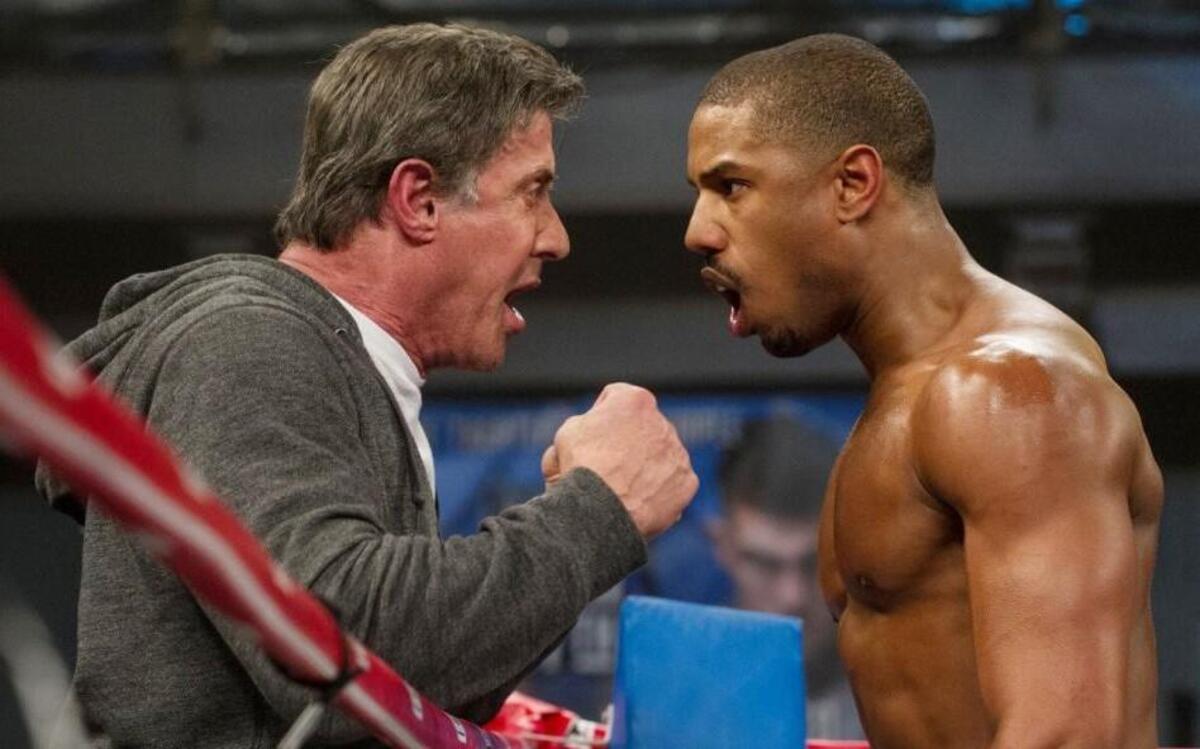 From left, Sylvester Stallone stars as Rocky Balboa and Michael B. Jordan stars as Adonis Creed in “Creed.” Stallone is nominated for Best Supporting Actor in the film.