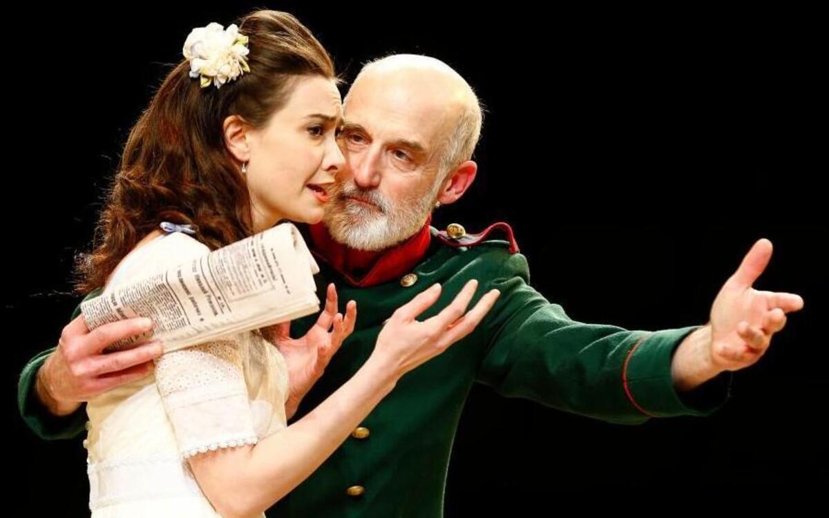 From left, Allison Altman as Irina Sergeyevna and Ray Dooley as Ivan Romanovich Chebutykin in PlayMakers Repertory Company’s production of “Three Sisters” by Anton Chekhov in a new version by Libby Appel. Jan. 20-Feb. 7, 2016. Directed by Producing Artistic Director Vivienne Benesch.