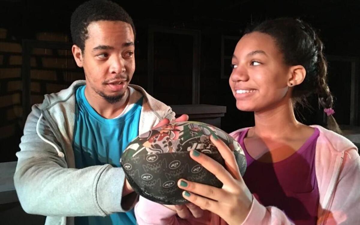 From left, Ron Lee McGill as Tray enjoys a quiet moment with his sister Dee played by Gabrielle Scales in Manbites Dog's production of “brownsville song (b-side for tray)” by Kimber Lee.