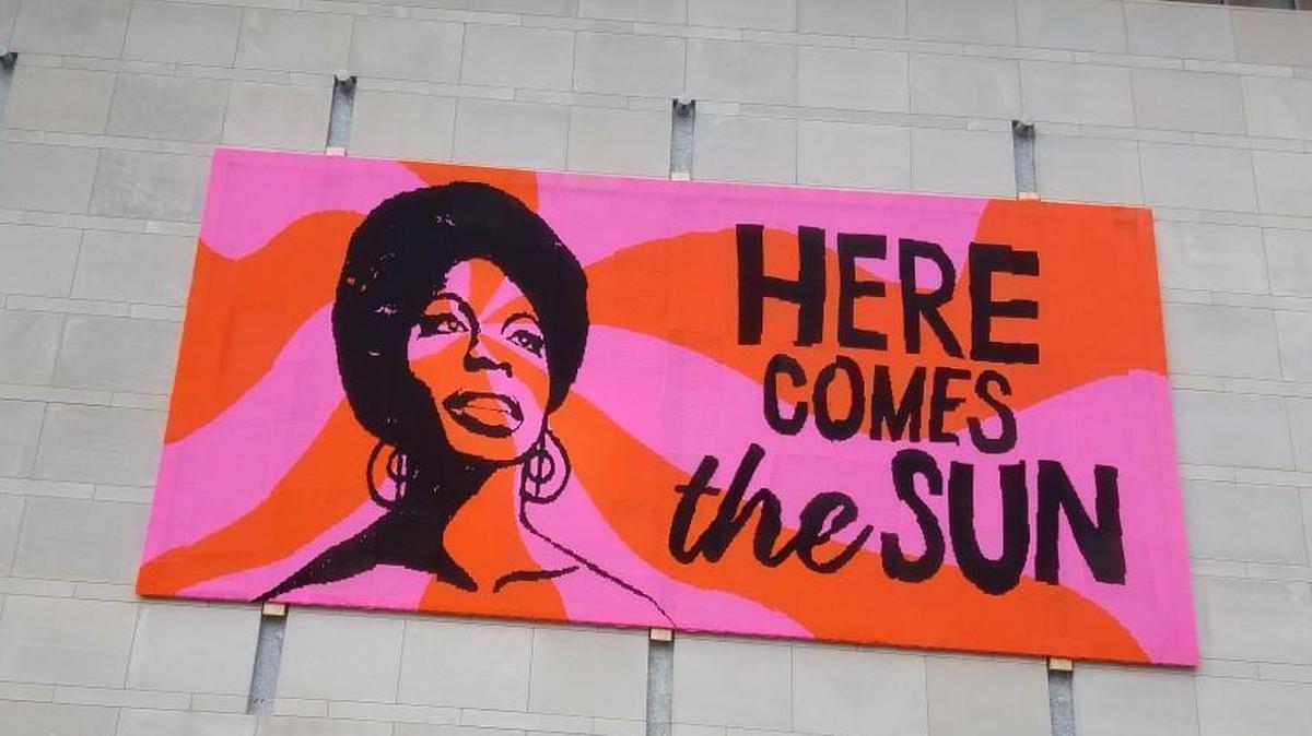 Nina Simone appears in a yarn mural by the artist Olek on the exterior wall of the Raleigh Convention Center. It’s part a project called “Love Across the USA,” which Olek was inspired to create following January’s Women’s March in Washington, D.C. Simone, a North Carolina native born in Tryon, is the third mural in the series.