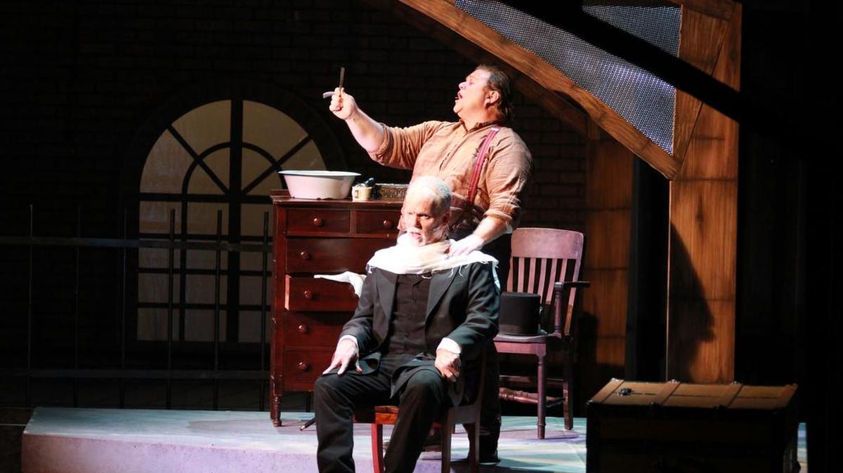 From bottom, Joel Rainey as Judge Turpin and David Henderson as Sweeney Todd in Raleigh Little Theatre’s production of “Sweeney Todd.”