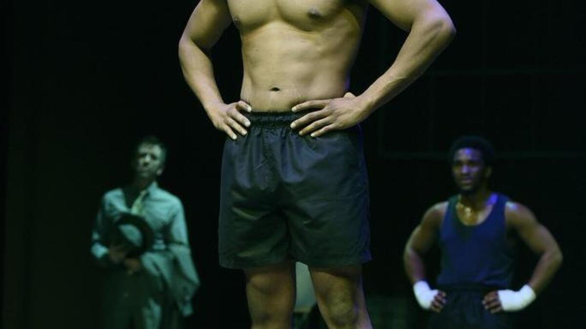 Alex DeVirgilis, Preston Campbell (center) and Sheldon Mba in the Burning Coal Theatre Company production of Marco Ramirez’ “The Royale.”