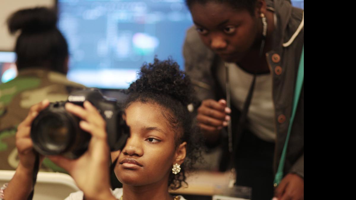 
Student Marasia Jeter, center, composes a shot at the School of Doc, on Thursday, July 2, 2015. School of Doc is a five-week documentary filmmaking program for students from grades nine through 12 run by the Full Frame Documentary Film Festival.
