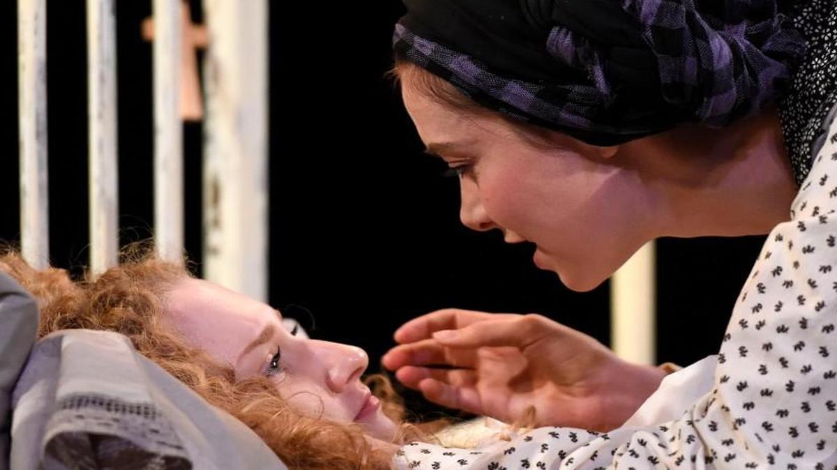 From left, Gabriella Cila as Betty Parris and Allison Altman as Abigail Williams in PlayMakers Repertory Company’s production of “The Crucible” by Arthur Miller.