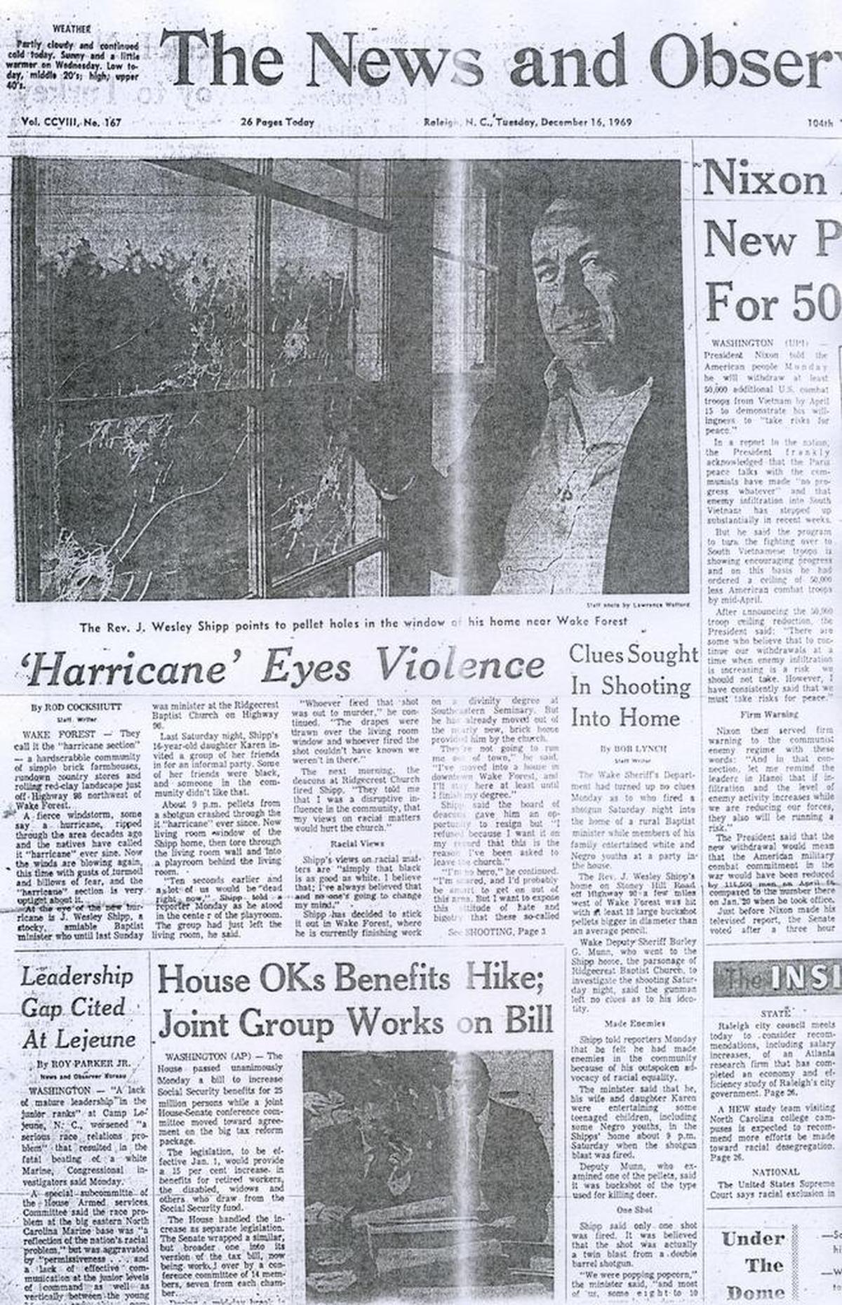 A photograph of John Wesley Shipp’s father and the pellet holes in the window of their home in Wake Forest was on the front page of The News & Observer in December 1969.