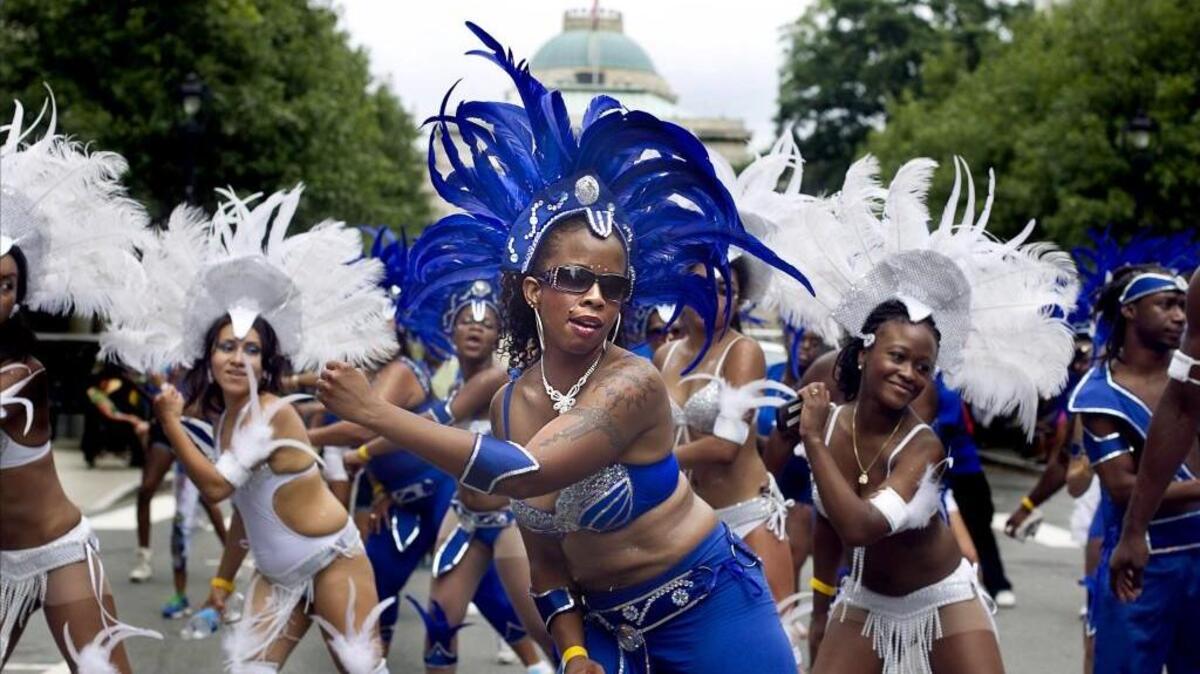 
Watch beautifully costumed partiers parade into CaribMask Festival Village at the 4th annual CaribMask Carnival in downtown Raleigh. 
