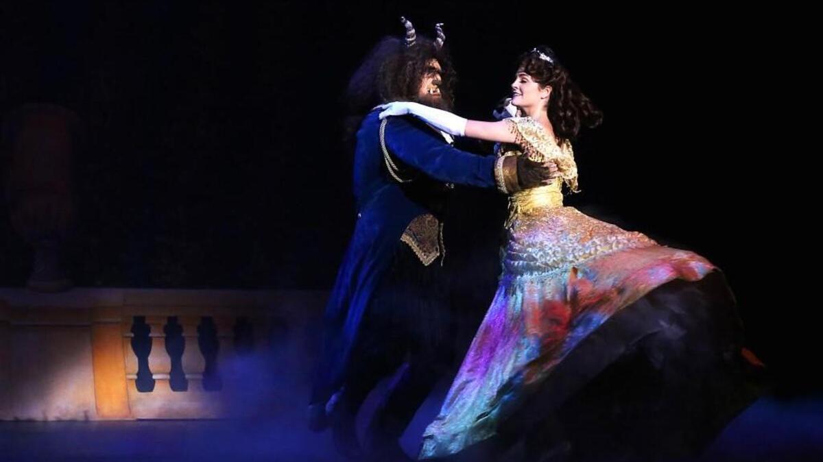 Ben Michael (The Beast) and Catherine Charlebois (Belle).