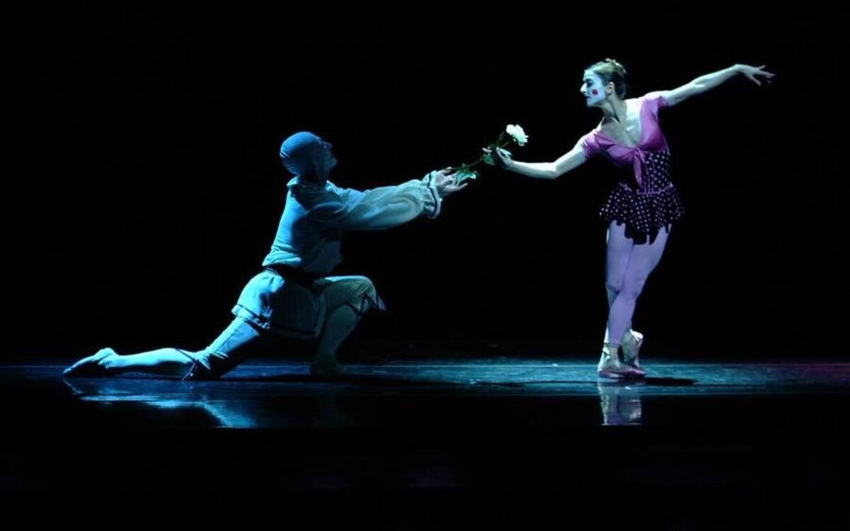 From left, Mikhail Nikitine and Melissa Podcasy in the Carolina Ballet’s production of “Petruschka.”