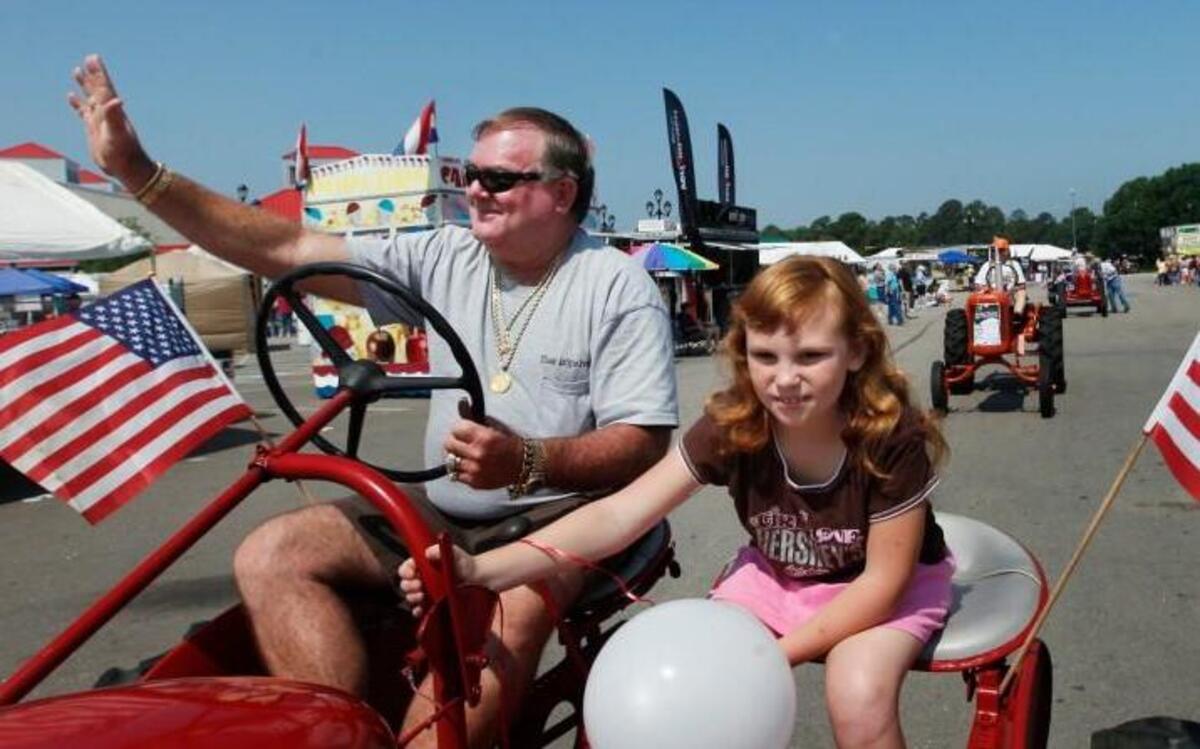Catch an antique tractor parade at the opening ceremonies of the Got To Be NC Festival.