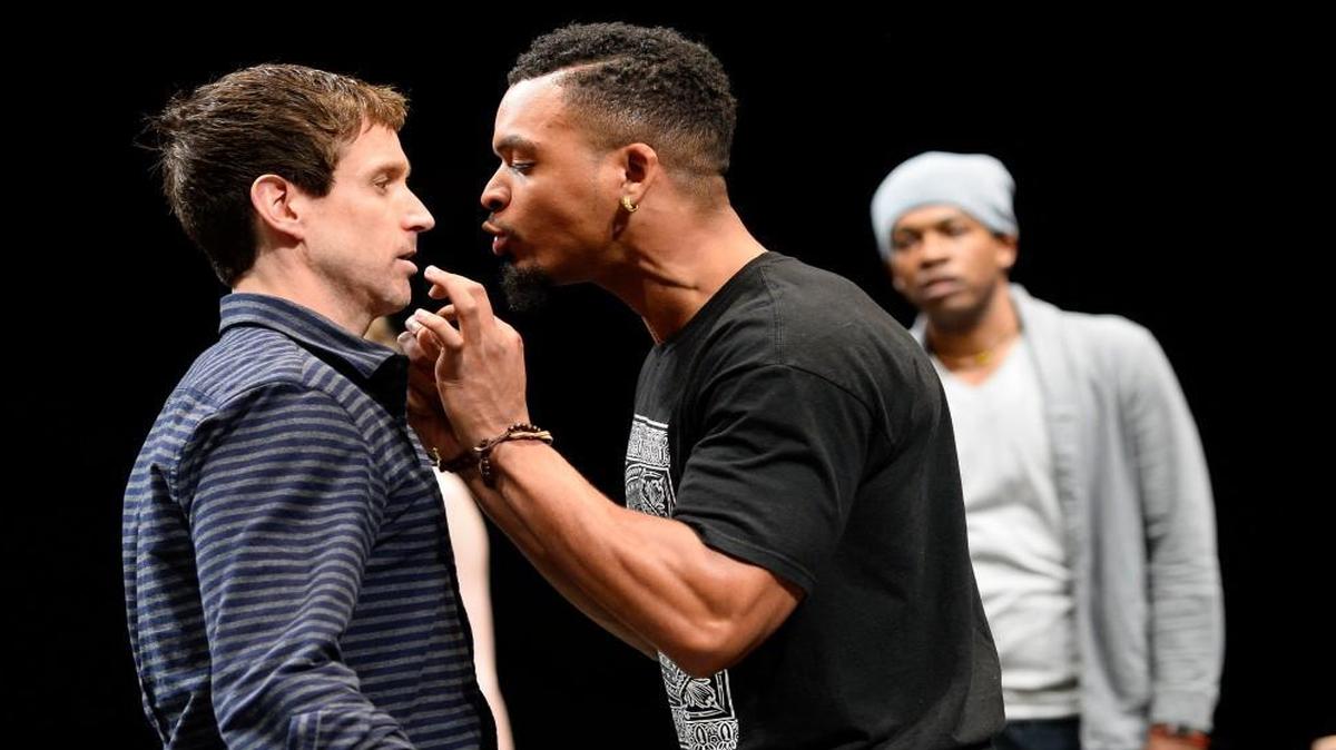 From left, Schuyler Scott Mastain as Actor 1/White Man, Myles Bullock as Actor 2/Black Man and Genesis Oliver as Actor 4/Another Black Man in PlayMakers Repertory Company’s production of “We Are Proud to Present a Presentation…” by Jackie Sibblies Drury. Feb 24-Mar 13, 2016.