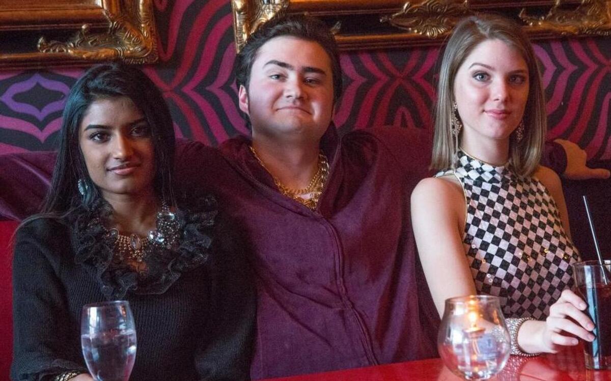 From left, Maanasa Thyagarajan, Hunter Ives and Rebecca Rushing in University Theatre’s production of “The Real Housewives of Windsor,” an adaptation of William Shakespeare's “The Merry Wives of Windsor.”