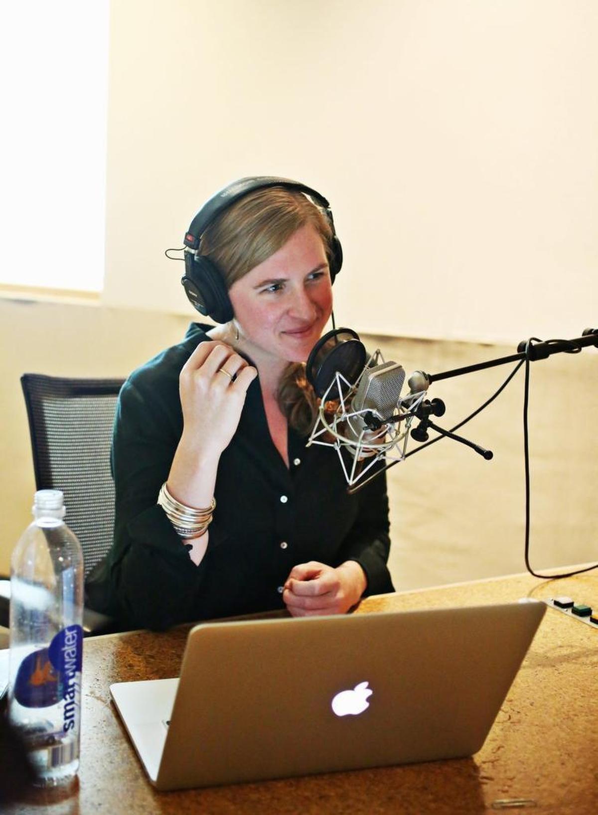 Phoebe Judge, the host and co-creator of the “Criminal” podcast, in a studio at WUNC in Chapel Hil.  “Criminal” has recently launched a spinoff with Judge reading from an Agatha Christie mystery novel.