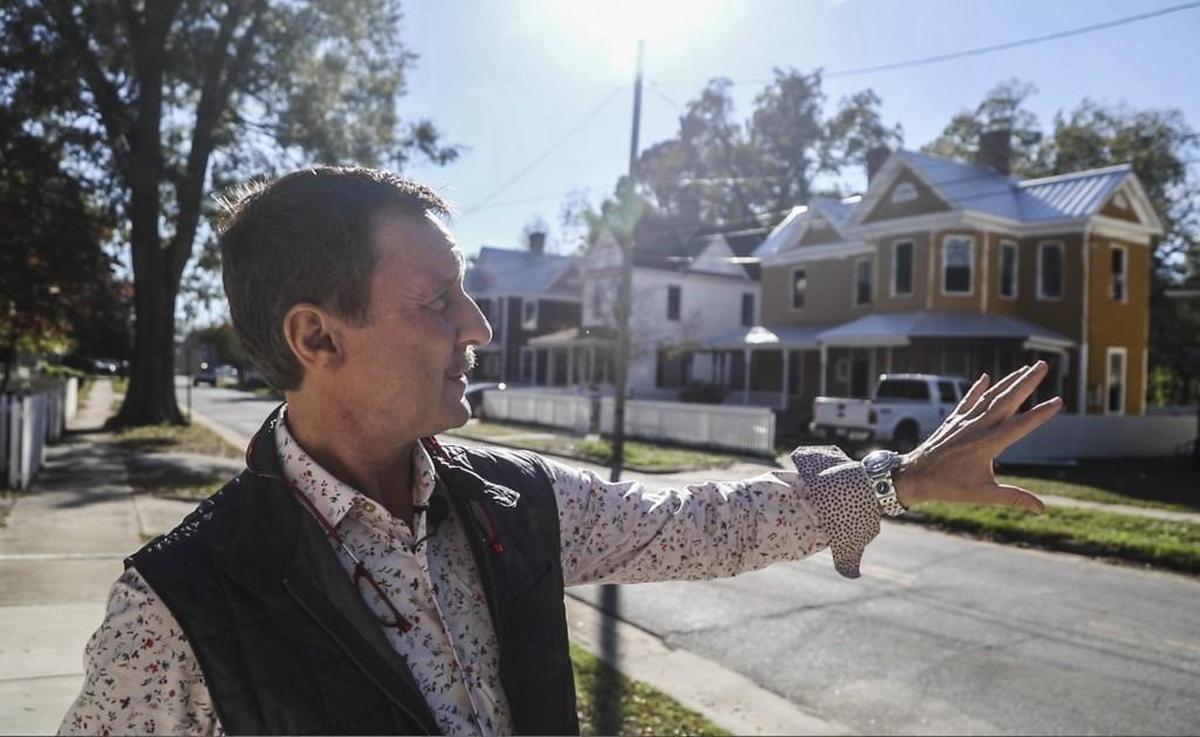 Stephen Hill, co-owner of Mother Earth Brewing and other Kinston businesses, points out some of the historic homes he has renovated in the Kinston arts district Thursday, Nov. 16. Kinston is emerging as an unlikely arts hub as Hill attracts artists to the Eastern North Carolina town by renting them houses at affordable prices.