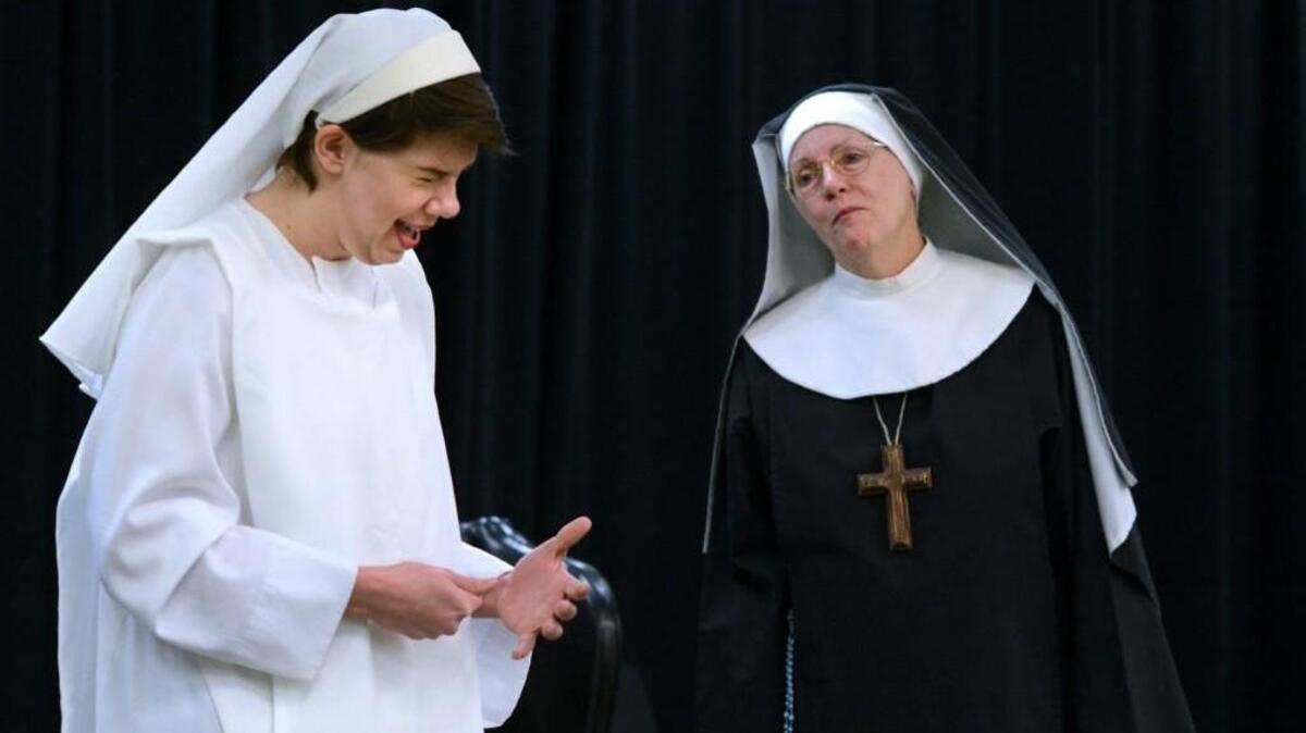 From left, Jill Cromwell as Agnes and Gilly Conklin as Mother Miriam in Wake Forest’s Forest Moon Theater’s production of “Agnes of God.” The theater takes its production of John Pielmeier’s 1979 play on the road this weekend to Raleigh’s Sonorous Road Theatre.