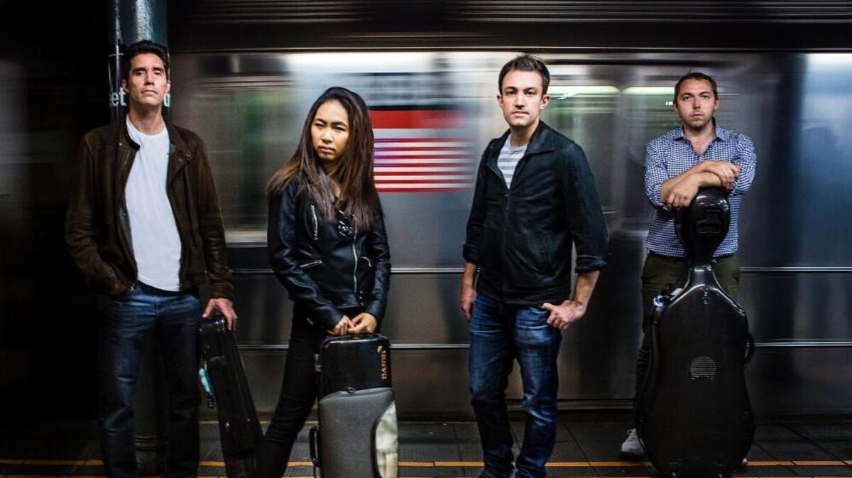 Escher String Quartet is joined by Grammy-winning guitarist Jason Vieaux for Boccherini’s “Fandango” Guitar Quintet Dec. 9 at Duke University’s Baldwin Auditorium.