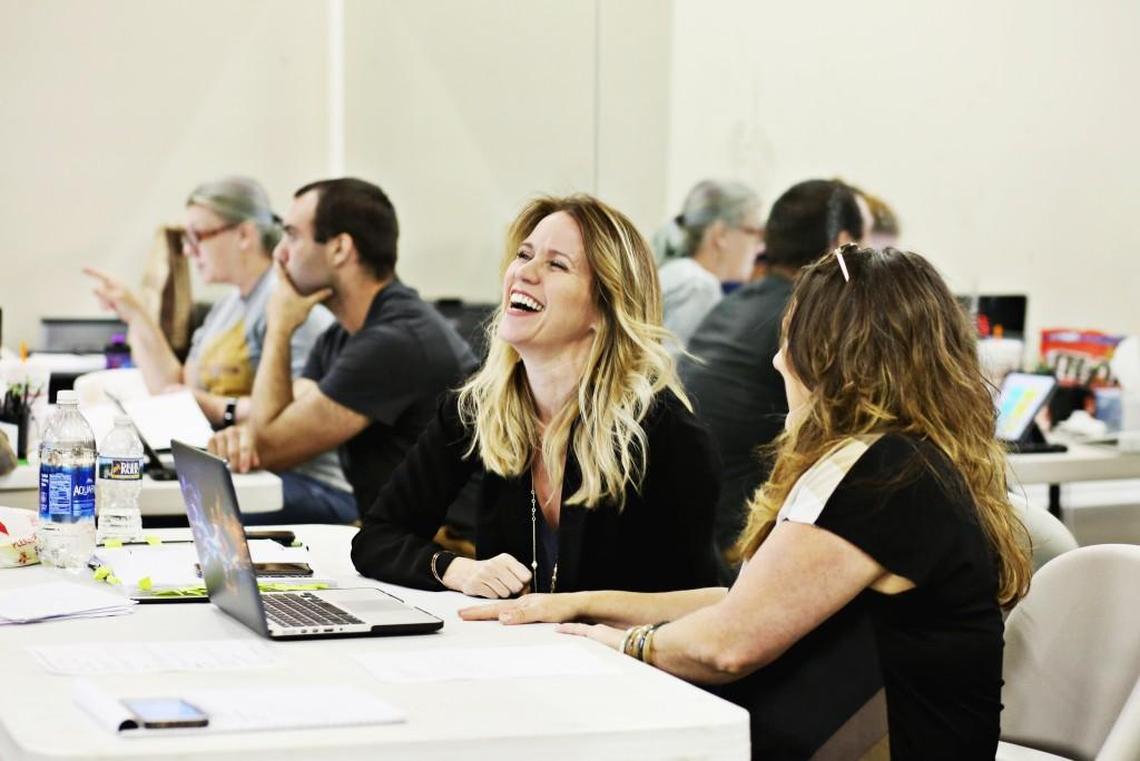 Lauren Kennedy, center, watches a rehearsal of “Rock of Ages” in 2017 at Cary’s Koka Booth Amphitheatre. Kennedy and three family members are trying to return from an African vacation. Their travel has been affected by the omicron variant of COVID-19.