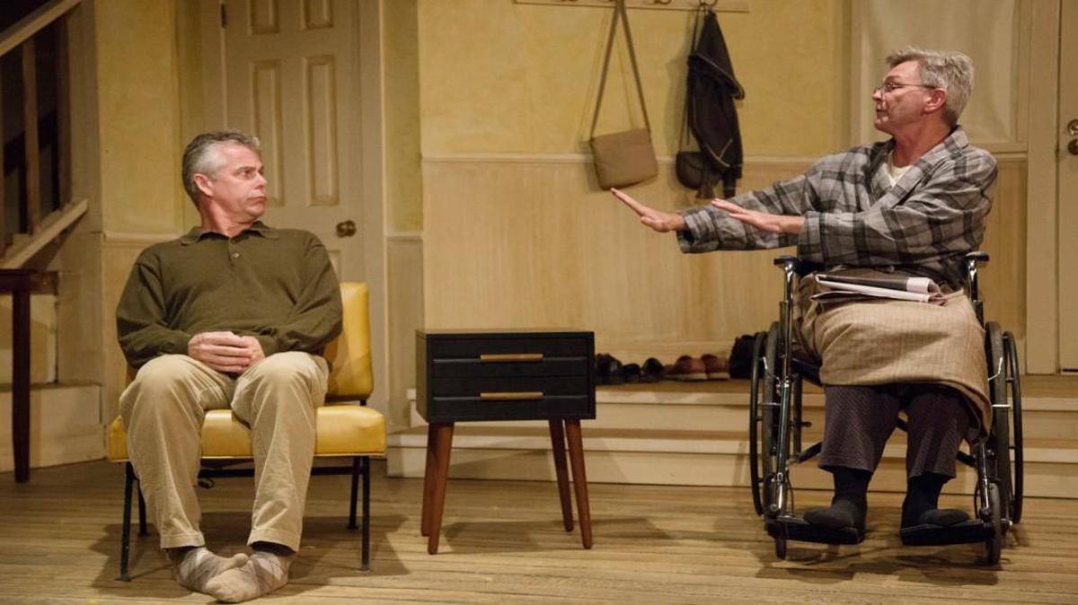 Uncle, played by Michael Brocki, has an awkward moment with Father, played by Michael Foley in Manbites Dog Theater’s production of “The Open House.”