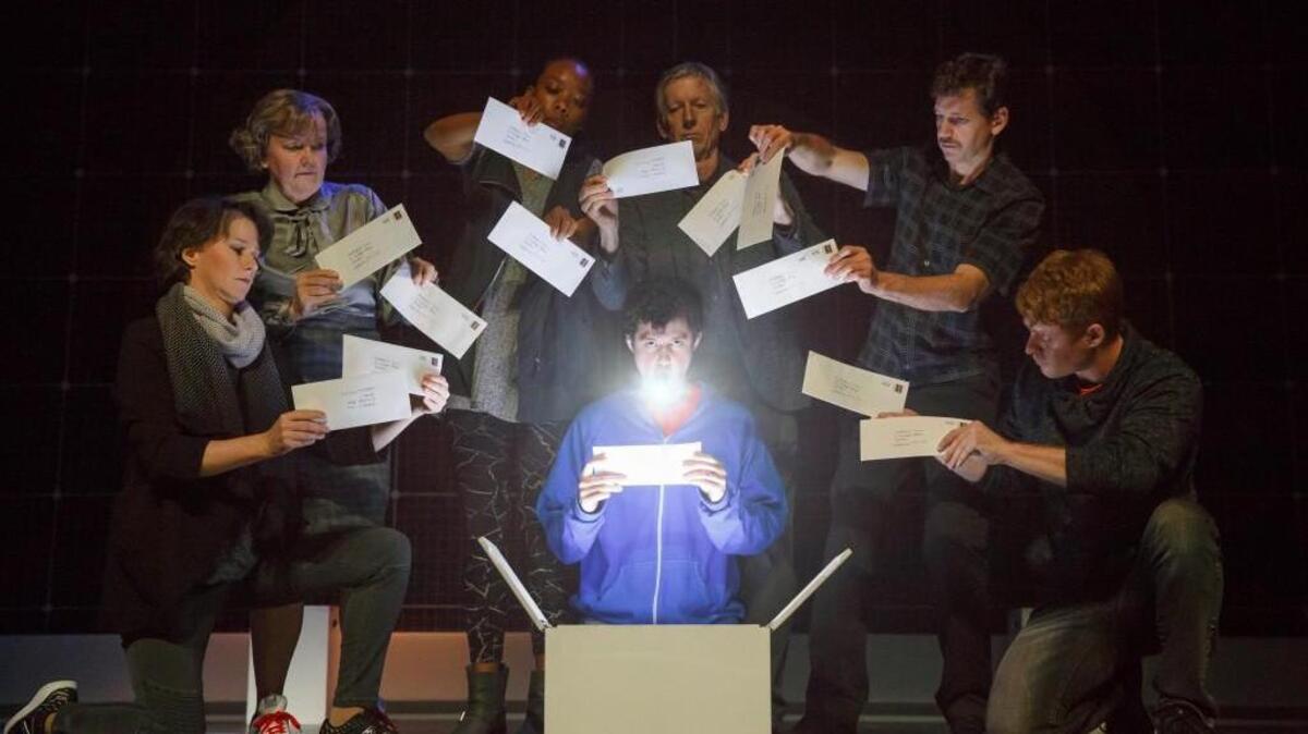 Adam Langdon as Christopher Boone, center, in “The Curious Incident of the Dog in the Night-Time.” The show runs Feb. 21-26 at DPAC.