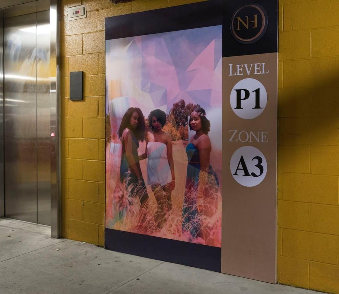 The North Carolina Museum of Art has installed 44 works by 27 teenage artists in the North Hills parking deck, where it will remain for three to five years. This features “Modern Graces,” a photograph by Savannah Allred.