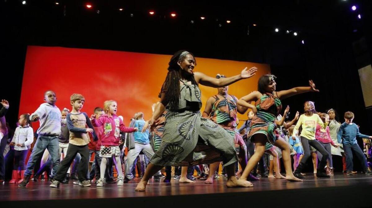 Members of the Kuumba Dance Company show kids (and a few adults) some of their dance moves as they perform at the annual Cary Kwanzaa Celebration at the Cary Arts Center on Dec. 29, 2016. This year’s event is Dec. 29.