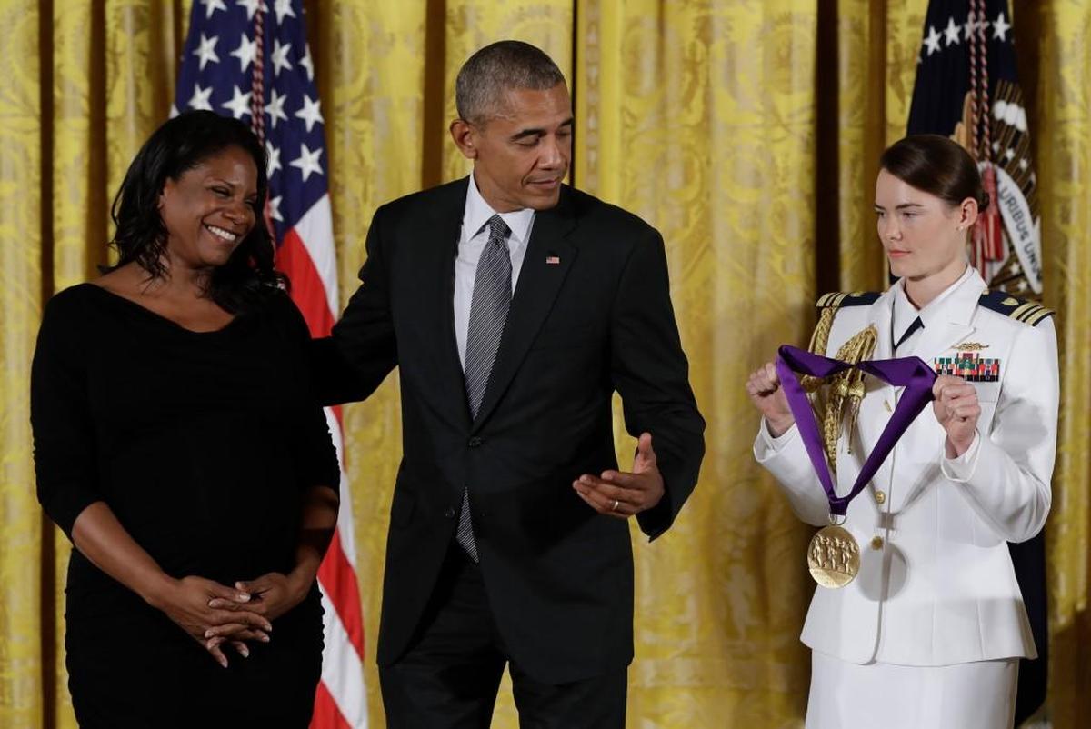 President Barack Obama awards actress and singer, Audra McDonald, the 2015 National Medal of Arts during a ceremony in 2016 in Washington.