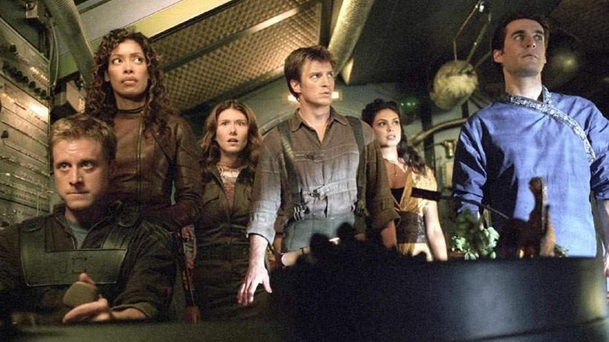 “Serenity,” starring Nathan Fillion (center), is Joss Whedon’s 2005 sci-fi adventure, a continuation of the single-season TV series “Firefly.”
