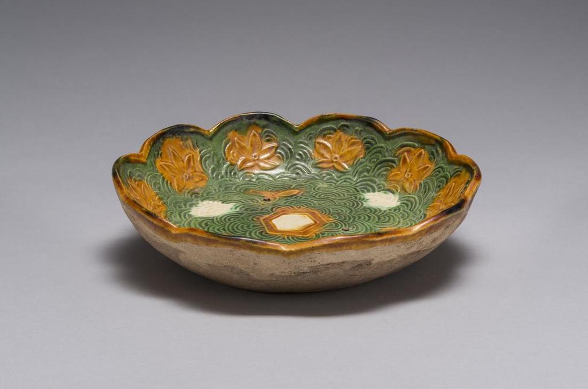 Austin Scarlett and Smith Freeman gifted this Sancai-Glazed Foliate Bowl from 10-11th century from an unidentified artist created during China’s Liao Dynasty (907-1125 CE) in honor of the Ackland Art Museum’s 60th Anniversary. The piece will be included in the museum’s exhibit “Birthday Presents,” which will feature roughly 60 works of art from 30 different donors.