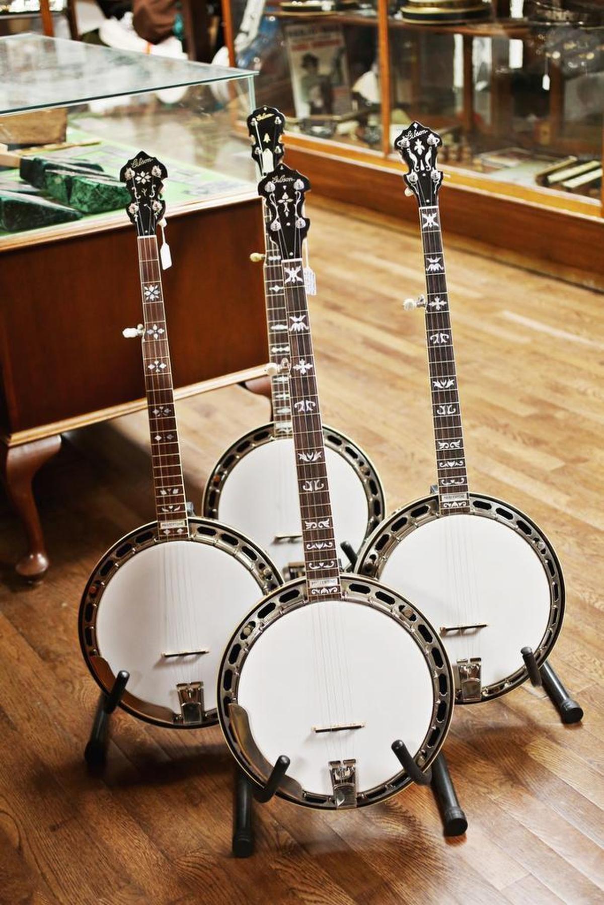 Banjo player Jim Mills collects and sells pre war era Gibson banjos in addition to his collection of Earl Scruggs bluegrass artifacts.