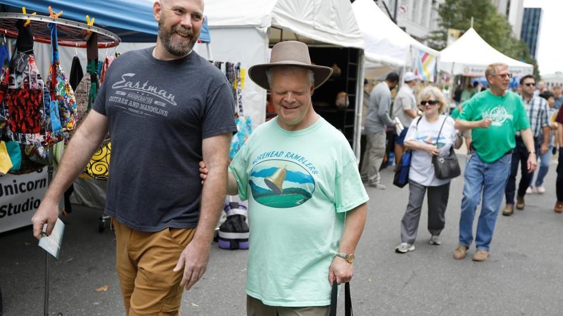 When the bluegrass festival comes to Raleigh, guides are needed to help the visually impaired