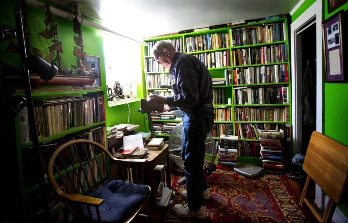 Vietnam War reporter Perry Deane Young lived among 2,500 books, which he sold online. “It’s all I need,” he said of his tiny apartment in the basement of The Compass Center in Chapel Hill. “I don’t need anything more.”