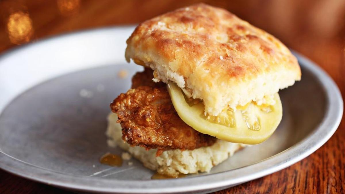 Ever wonder how a James Beard Award-winning chef can elevate a Southern classic? Find the answer in Ashley Christensen’s take on a fried chicken biscuit with pickled green tomato, dijon mustard and honey at Beasley’s Chicken + Honey in Raleigh.