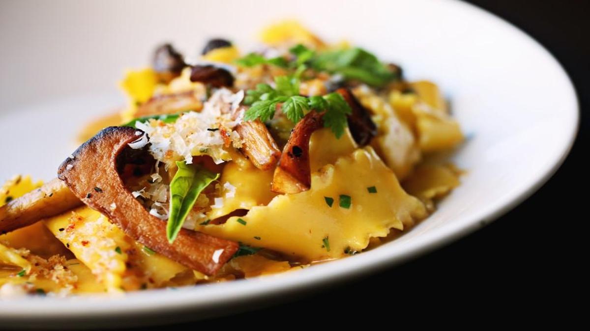 The tagliatelle is served in a porcini broth with roast oyster mushrooms, pecorino, chili, basil and breadcrumbs at Motto in Durham.