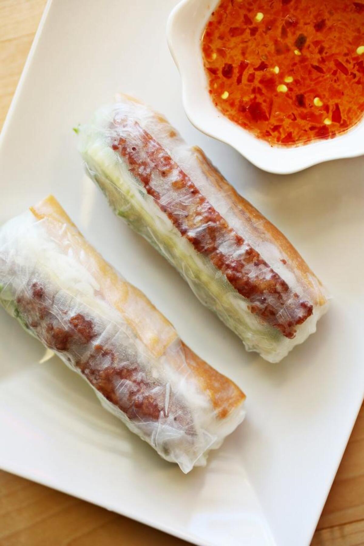 The supple, translucent wrappers of fresh sausage rolls, a twist on summer rolls amped up with house-made Vietnamese pork sausage, leave no doubt that the rolls were assembled to order at Mekong.