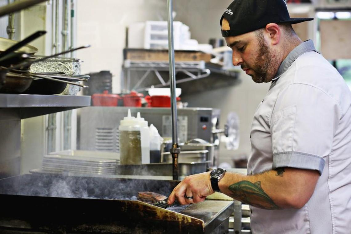 Executive chef Jeff Seizer prepares Duck A L’orange at Royale in Raleigh on Tuesday, April 18, 2017.