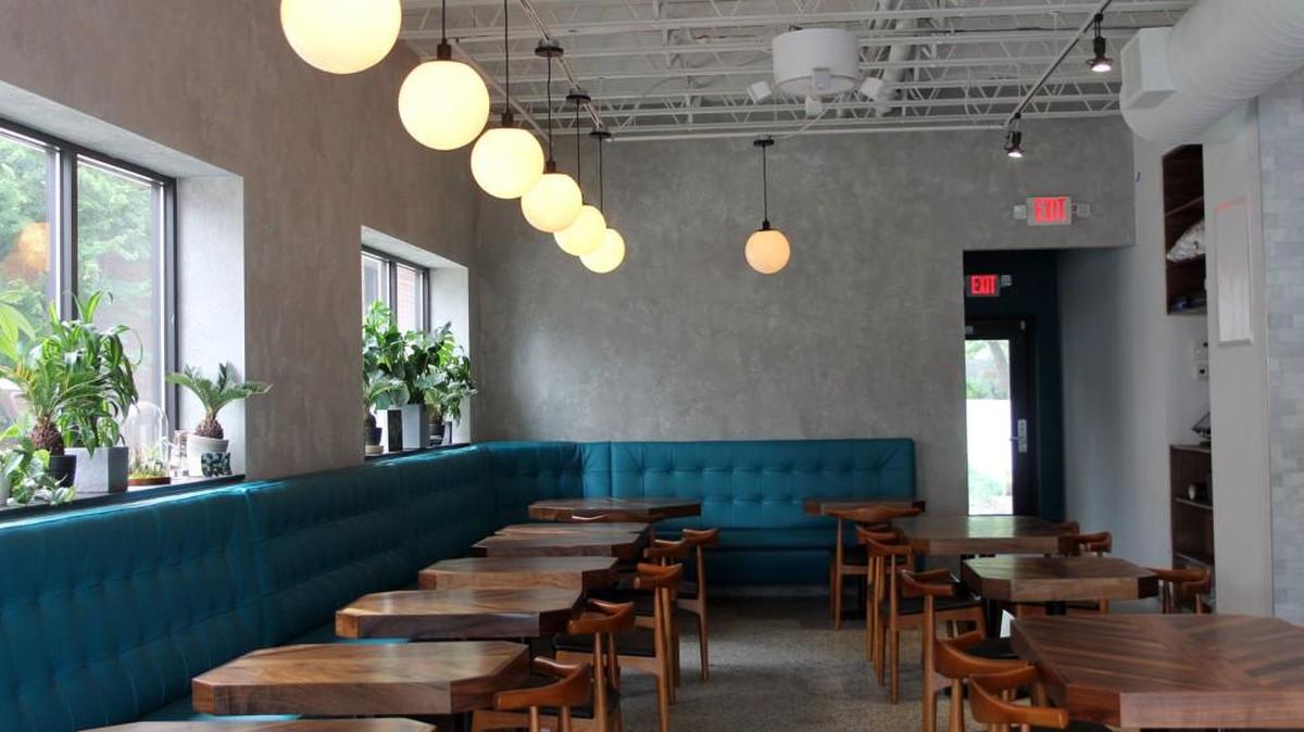 The Cortez, located in a mid-century building, is a sleek space with a contemporary feel. The owners wanted a tropical theme, but one that’s more subtle. Some of the seating is a lush teal leather.